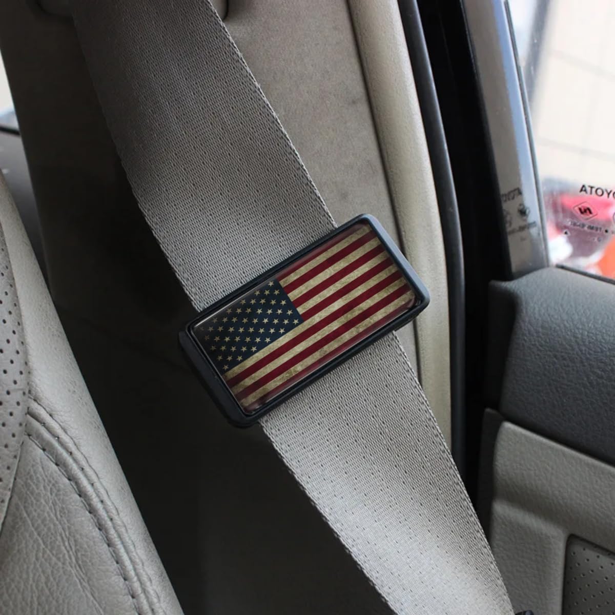 CLHMY seatbelt adjuster under the belt area showing discreet placement and comfort.