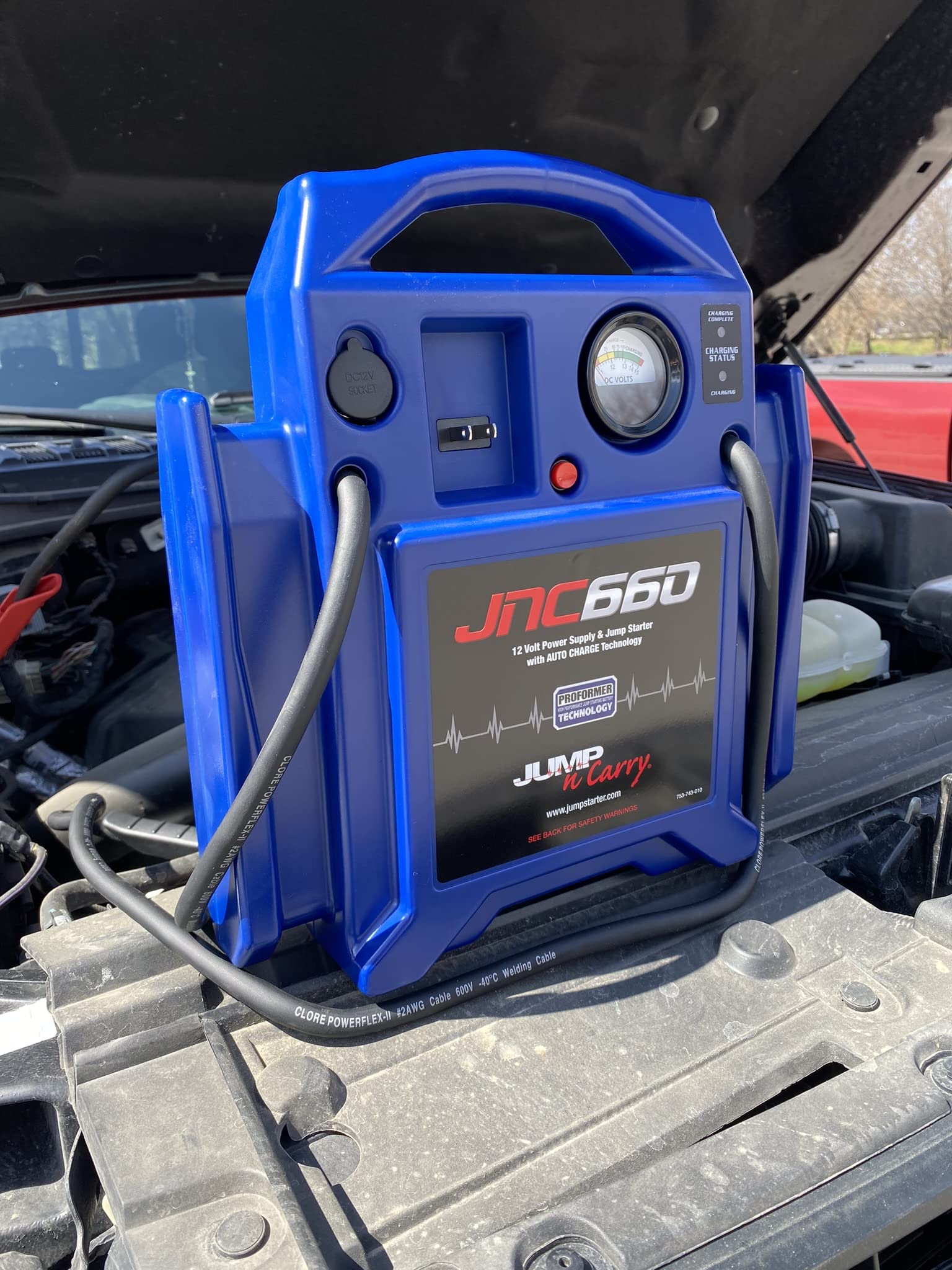 Heavy-duty JNC660 carry handle shown for easy transport and storage