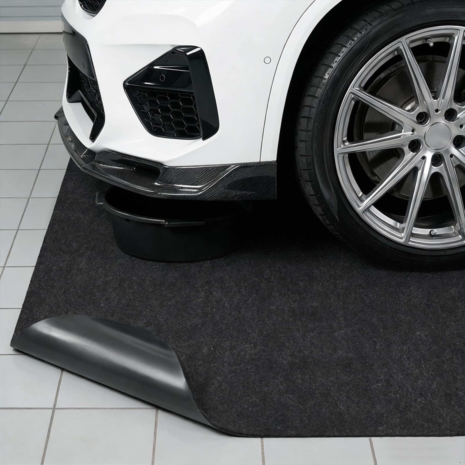 COAGOU mat has non-slip back to prevent movement on concrete.