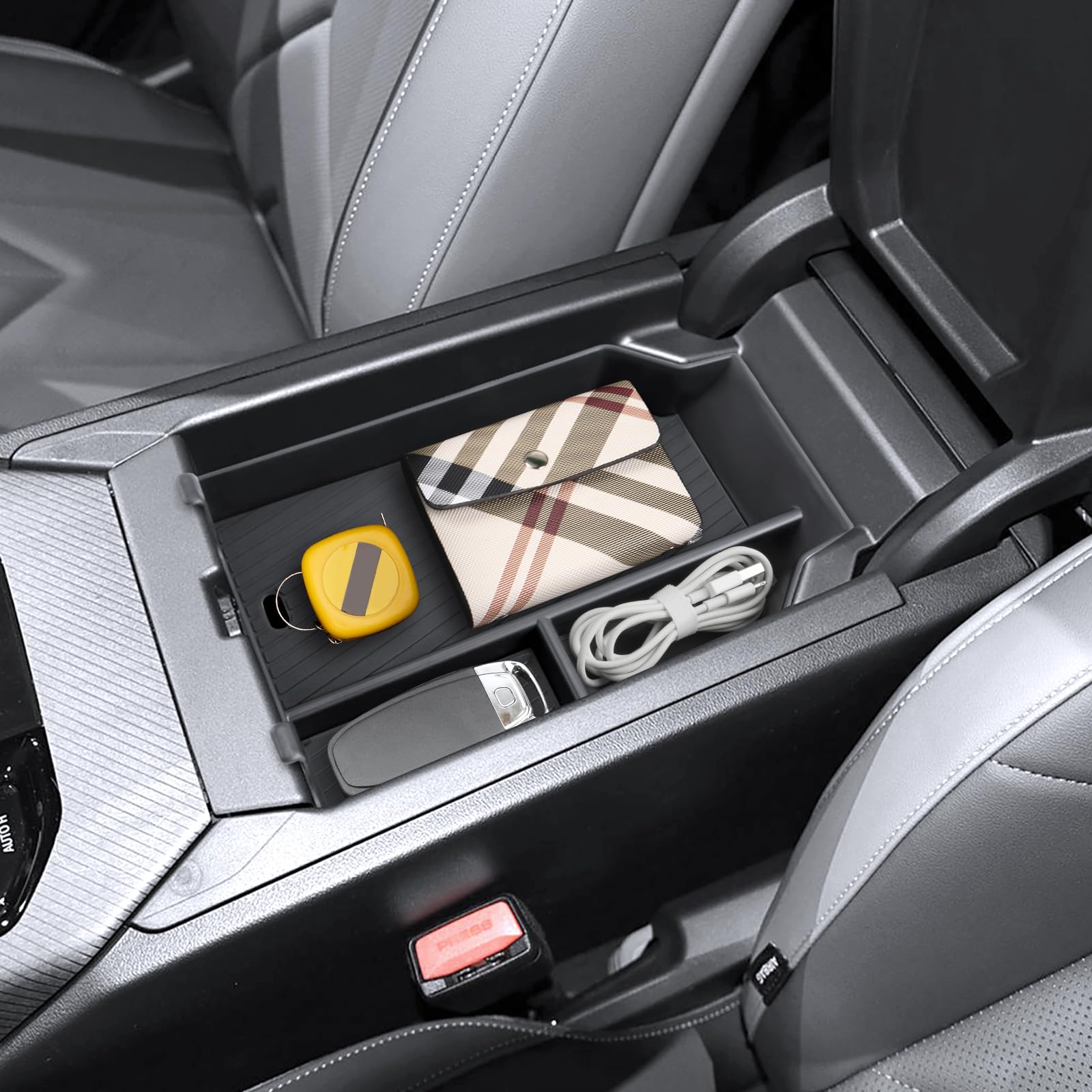 Coleya two-tier storage enhances reach and keeps items separated in the console.
