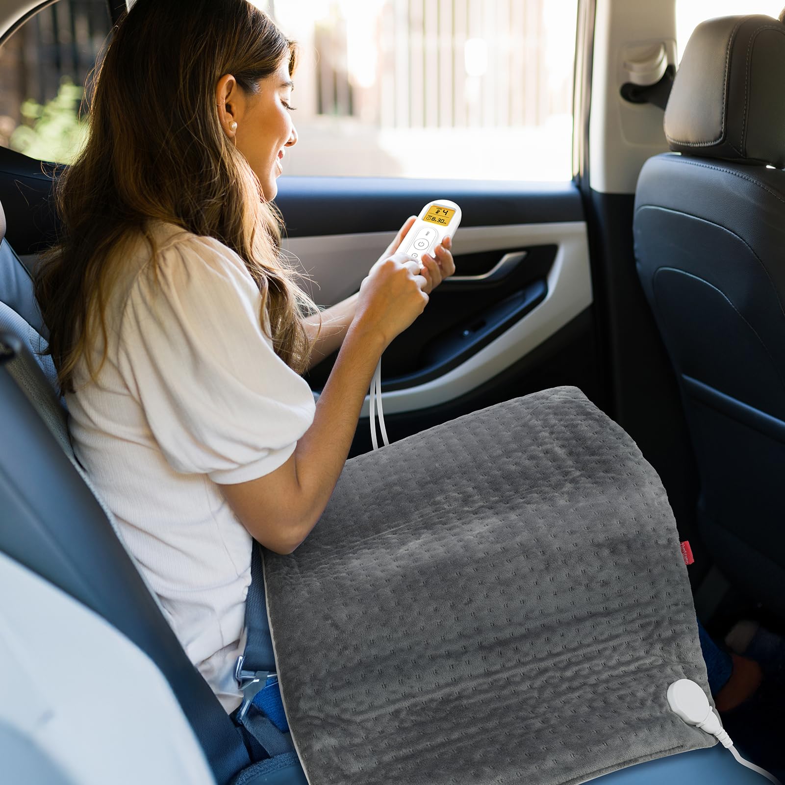 Comfytemp blanket features a long cord for backseat warmth sharing
