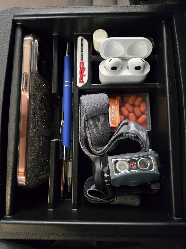 Complete Appearance Tacoma tray vertical chap-stick slot close-up for tidy convenience.