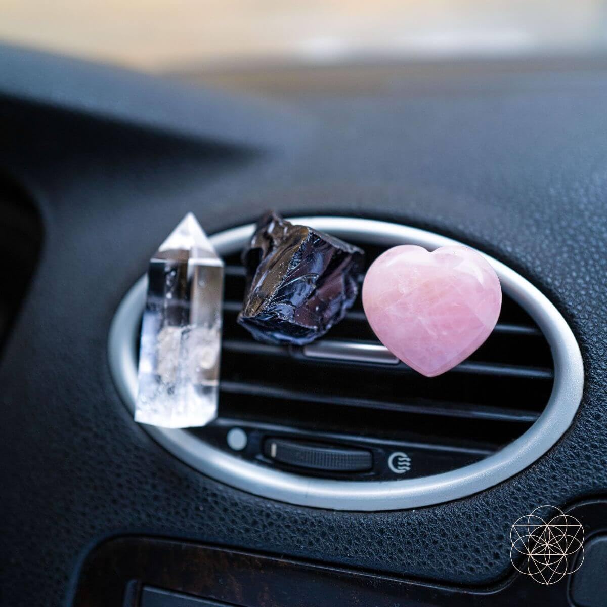 Conscious Items rose quartz vent clip for calming energy during drives.