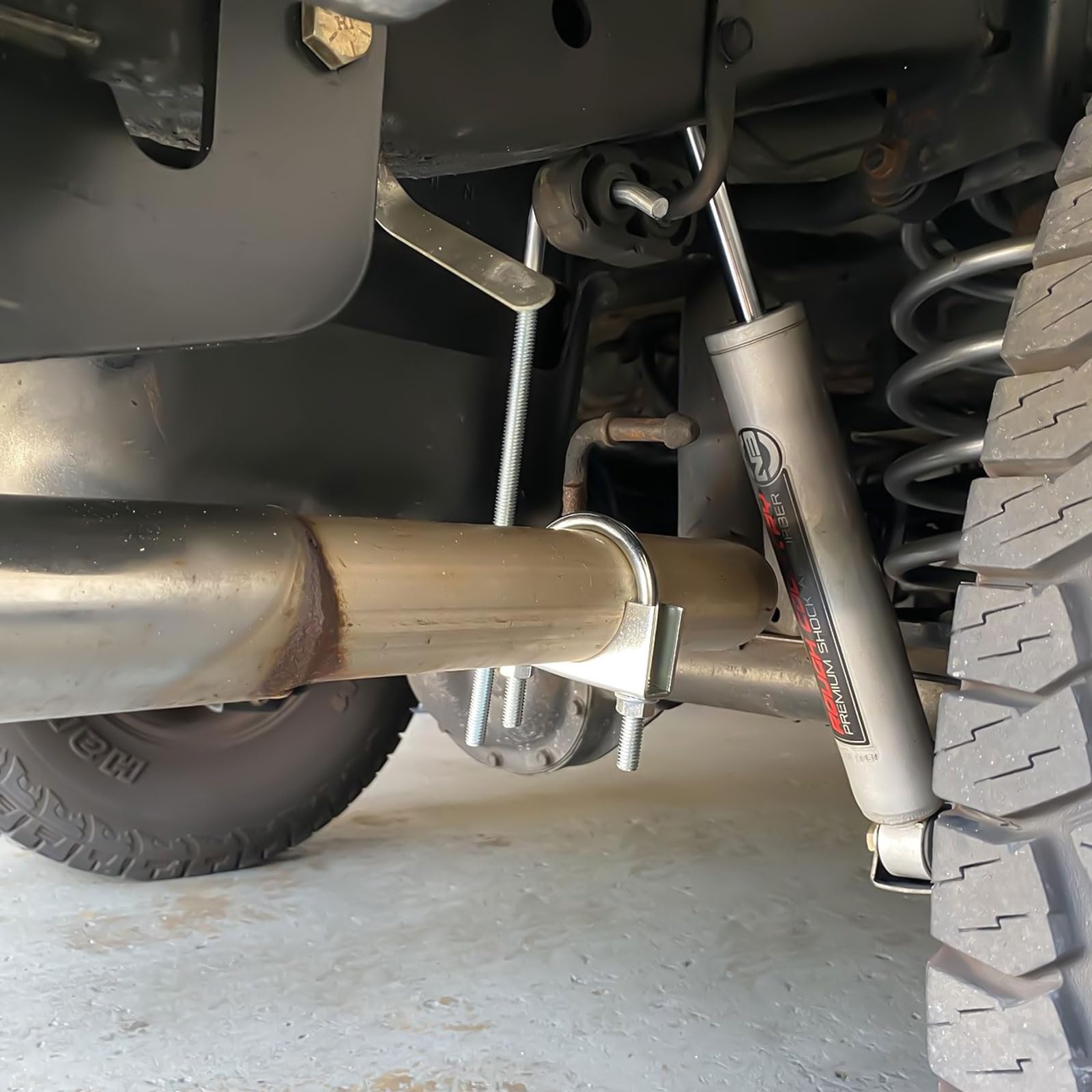 COROTC stainless steel exhaust clamp with hanger offers durability and rust resistance.