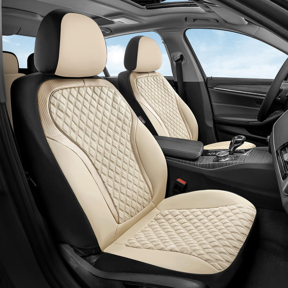 Coverado beige leather front seat covers with a diamond pattern provide luxurious protection.