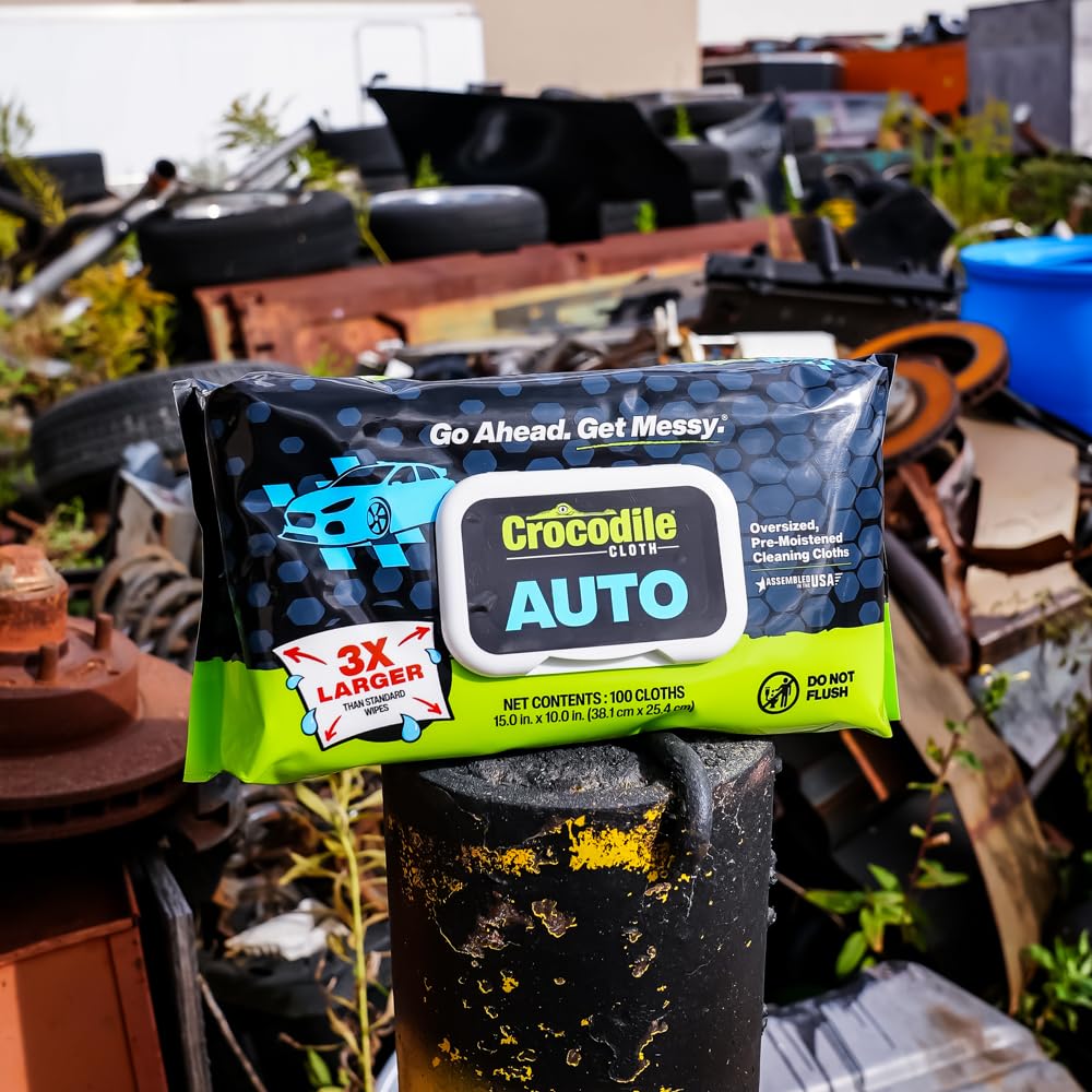 Crocodile Cloth Auto Cleaning Wipes dispensing from pack for quick cleaning.