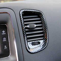 Crosselec carbon-fiber-look dash ornament for Durango improves cabin aesthetics.