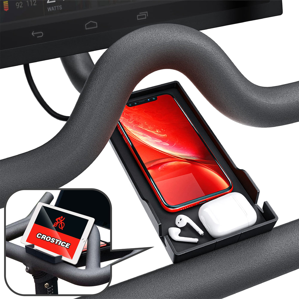 Crostice phone holder on a Peloton bike, secure and within reach.