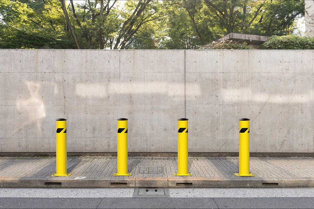Crowd Control Warehouse Trafford bollard ground installation protects access and parking.