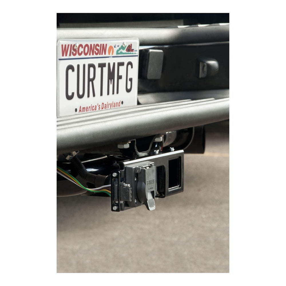 CURT bracket installed beside the trailer hitch for quick access to connectors.