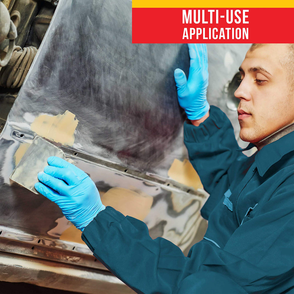 Custom Shop spreader applying auto body filler for clean surfaces