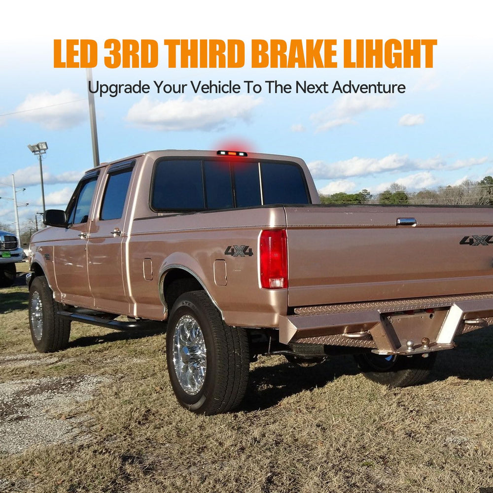 Cxdar third brake light LED vehicle-mounted rear light on a Ford model for easy retrofit.