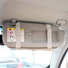 Da by car visor with five card holders helps keep licenses and cards organized.