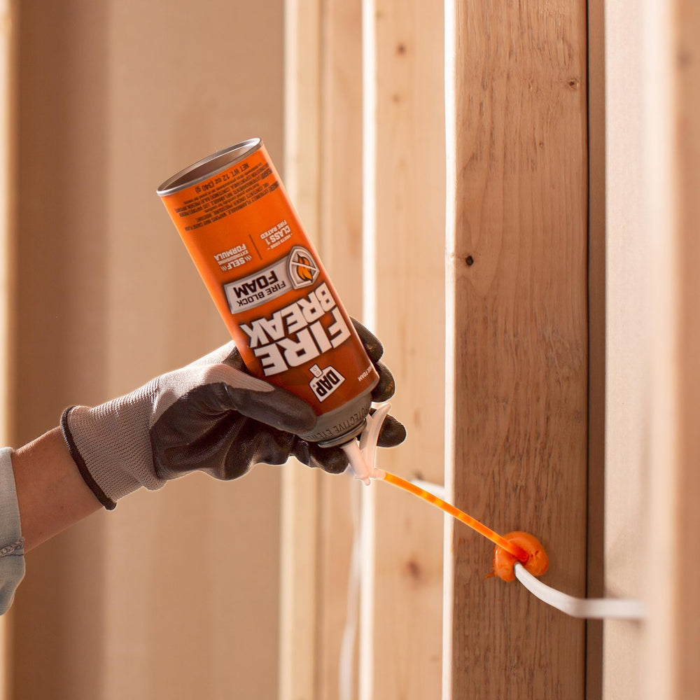 DAP FireBreak cured orange foam in wall visible during post-installation inspection