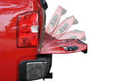 No-drill installation of DEE ZEE DZ43105 tailgate assist shown on truck.