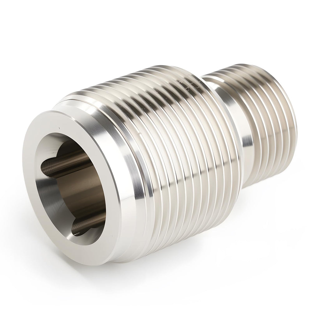 DEEFILL oil filter adapter assembly on engine, enabling larger 1 1/8-16 filters.