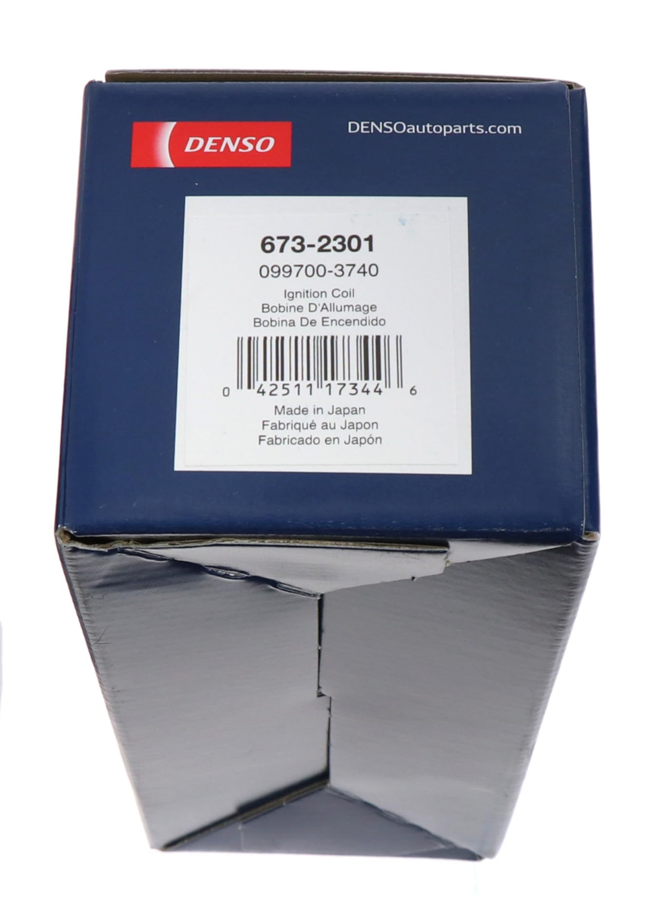 Denso 673-2301 brand stamp on coil housing signals quality and authenticity.