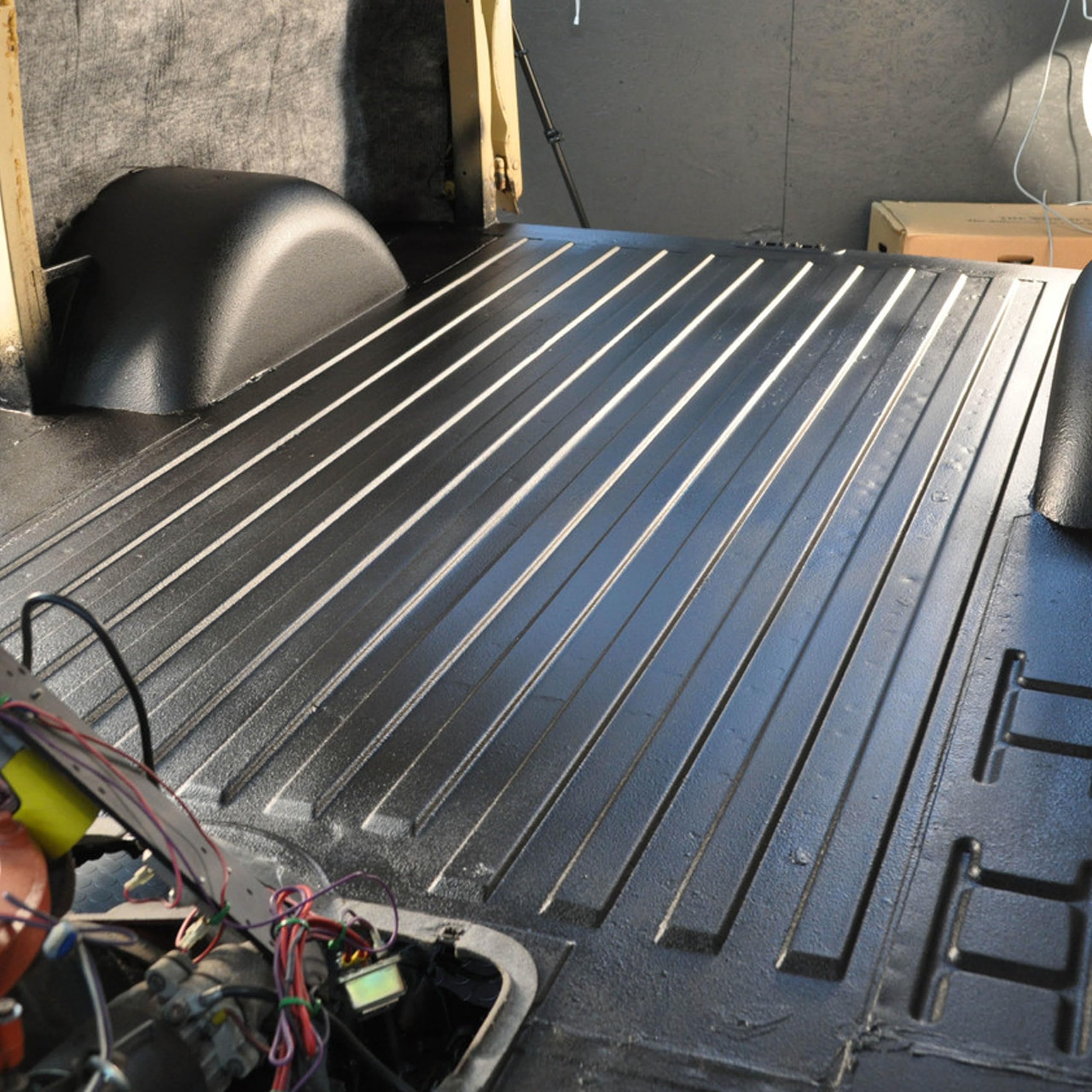 Design Engineering Boom Mat under-hood application dampens engine noise for a quieter cabin.