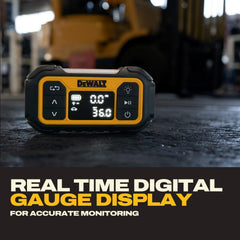 DEWALT inflator plugged into car 12V at night showing roadside convenience
