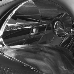 DNA MOTORING passenger-side angle highlights modern black/clear styling.