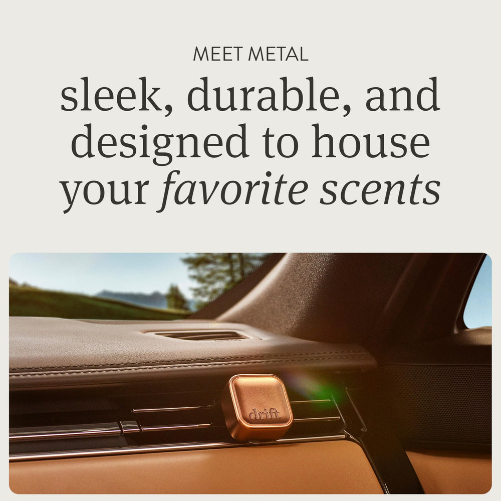 Drift vent clip refill inserted, providing long-lasting pine scent for car.