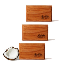 Drift wood air freshener on visor with metal clip.