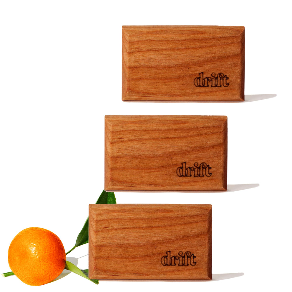 Drift wood air freshener with teak scent for a refined car interior.