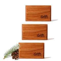 Drift wood air freshener on visor clip for long-lasting pine scent.