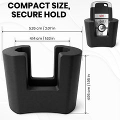 Center console insert keeps key upright without blocking cup holders.