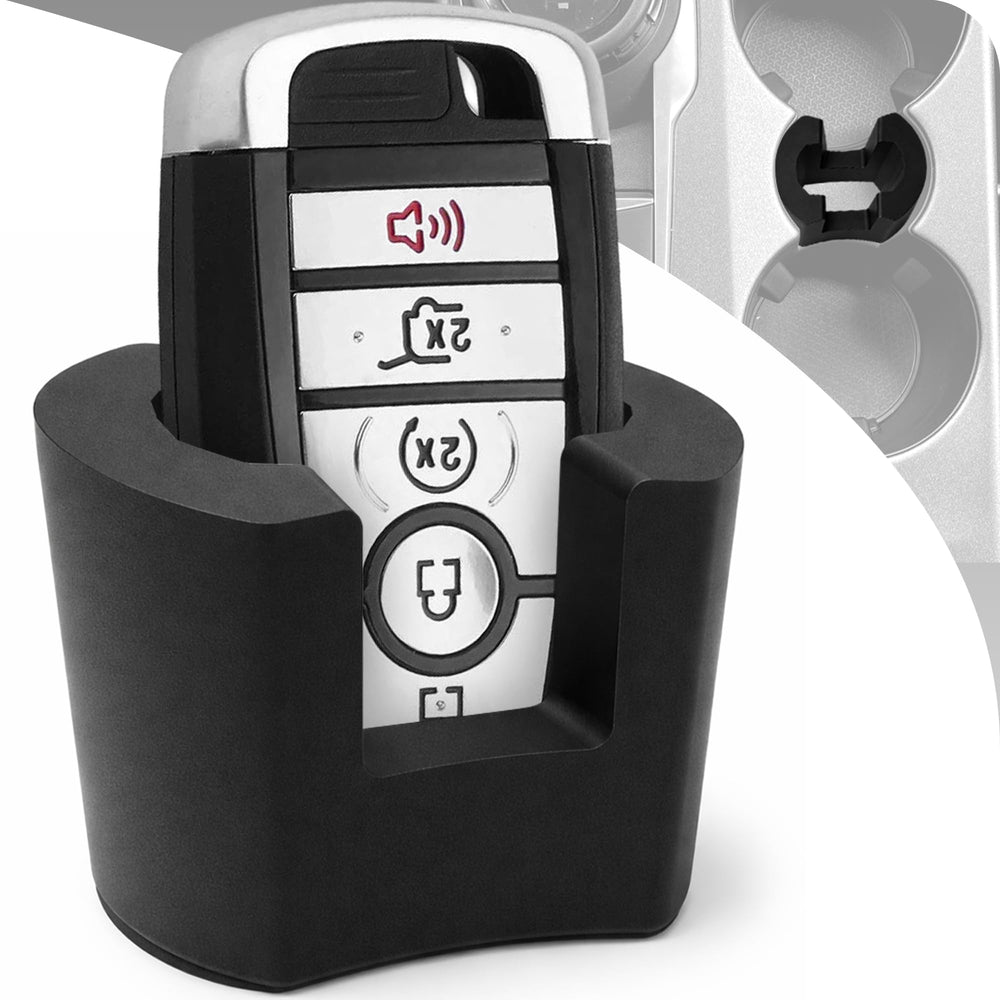 Key fob holder preserves cup holder usability for large bottles and cups.
