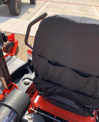 Installation straps on a Kubota/Kioti seat cover, quick secure setup.