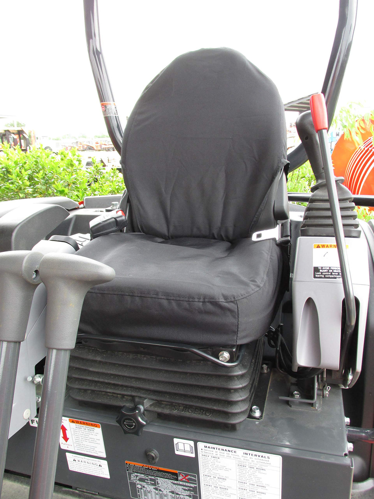Durafit seat covers on KX080 front seat provide waterproof protection and rugged durability.