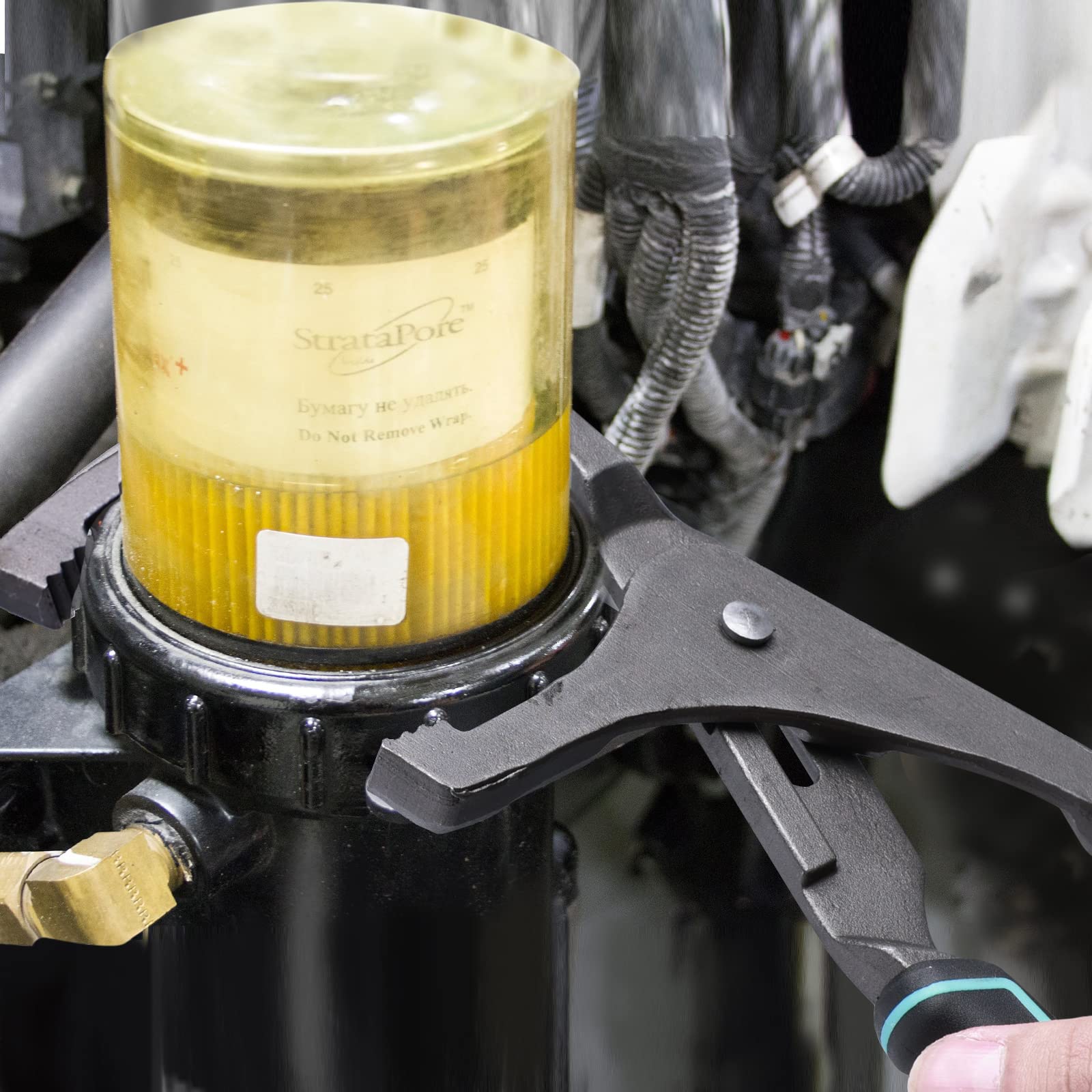 In-action shot showing easy oil filter removal and control