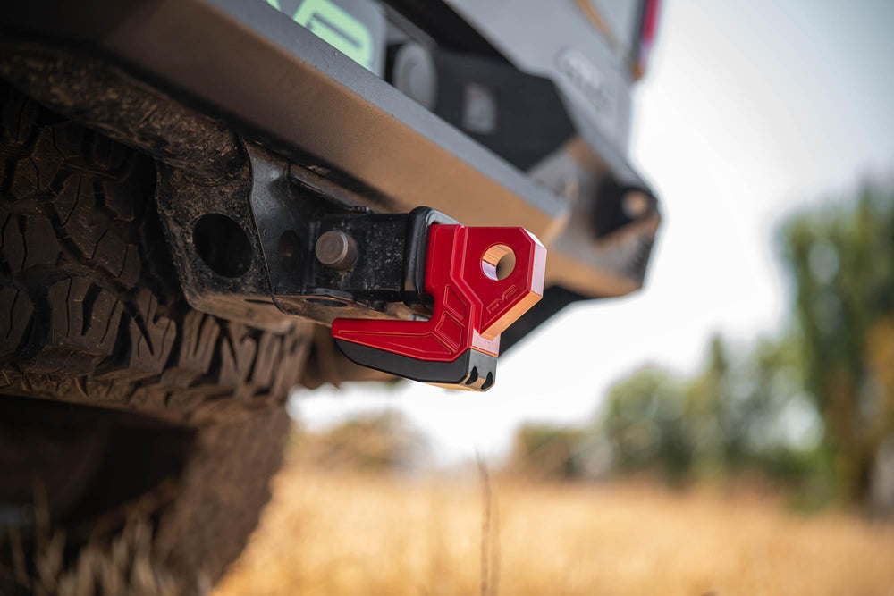 DV8 Offroad Xtract hitch skid plate black finish enhances durability on tough terrain