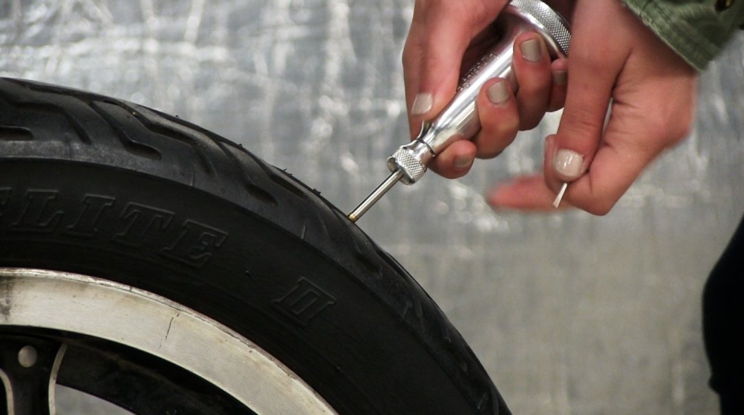Dynaplug Xtreme kit contents showing plugs and tubes for on-trail tire repairs.