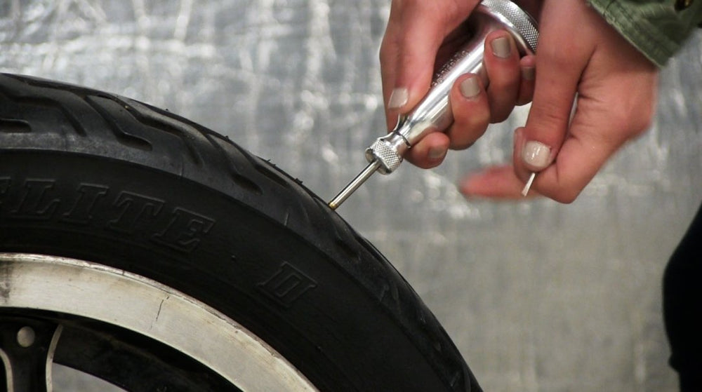 Dynaplug Xtreme kit contents showing plugs and tubes for on-trail tire repairs.