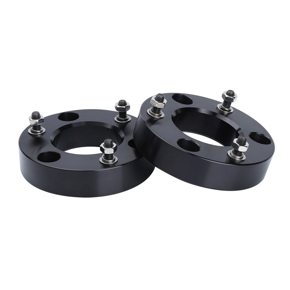 Dynofit Silverado 2in leveling front spacers raise the front end for better stance.