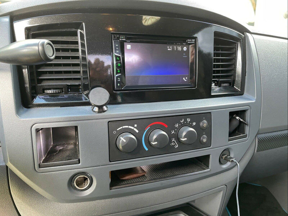 ECOTRIC dash bezel complements interior aesthetics with a clean finish.