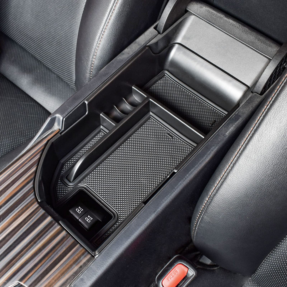 EDBETOS Camry console tray lower compartment keeps tools and gadgets neatly stored.