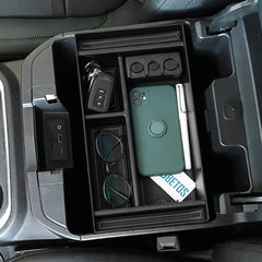 EDBETOS center console upper tray keeps phone and wallet within easy reach.