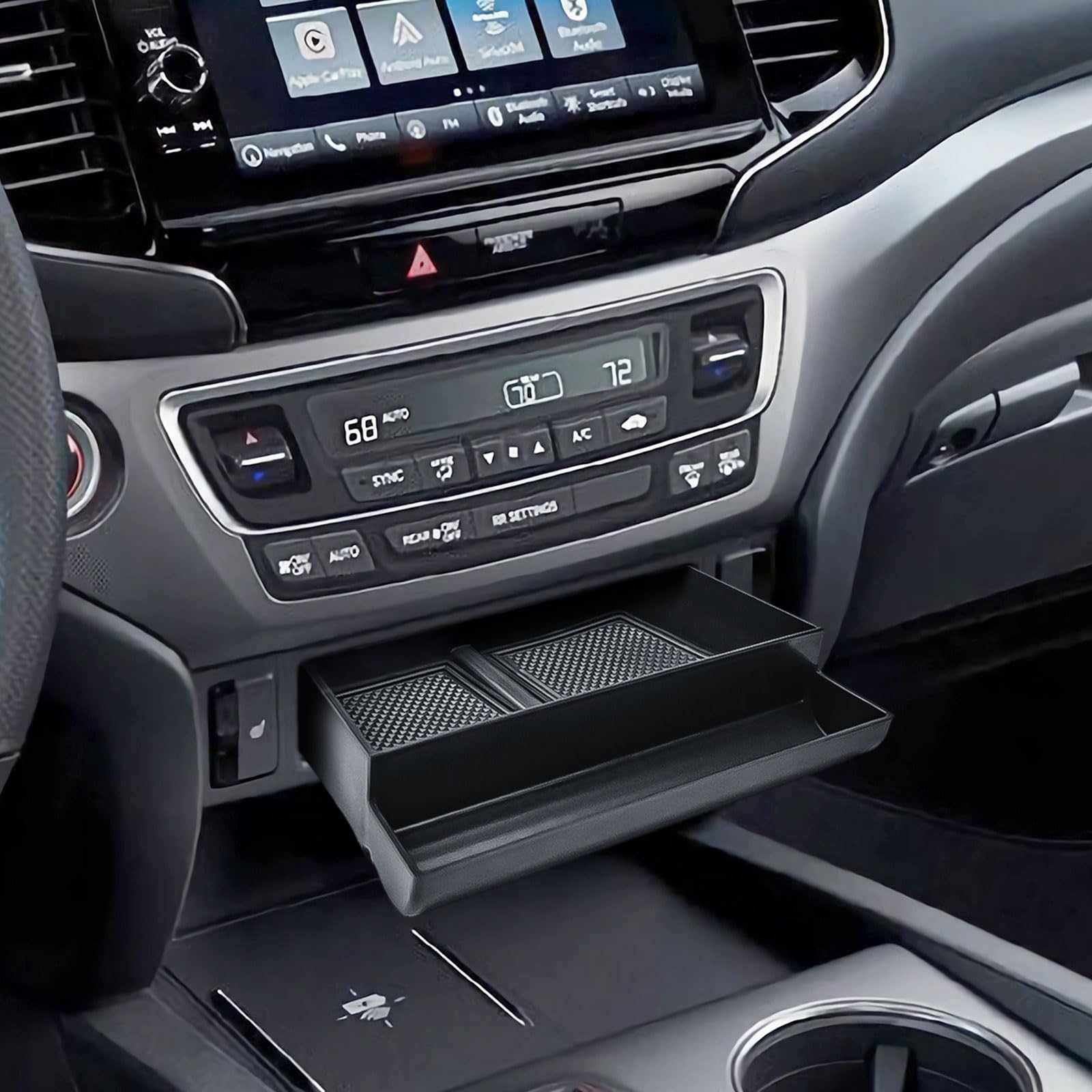 EDBETOS Passport-compatible tray adds organized space beneath the center dash.
