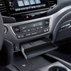 EDBETOS Passport-compatible tray adds organized space beneath the center dash.