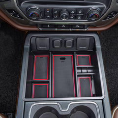 EDBETOS console organizer lower layer keeps gadgets organized and out of sight.