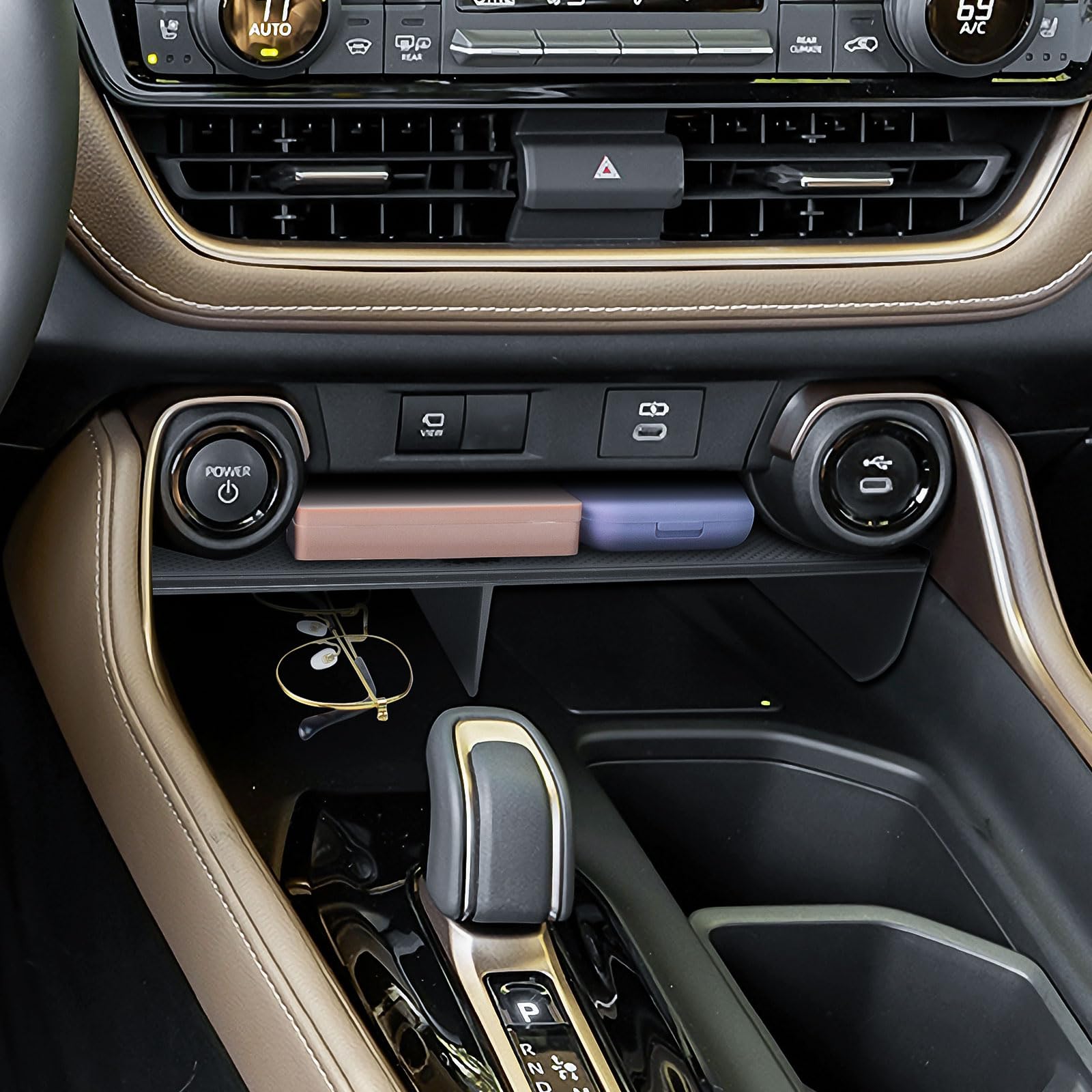 Double-compartment storage helps organize phone and keys efficiently.