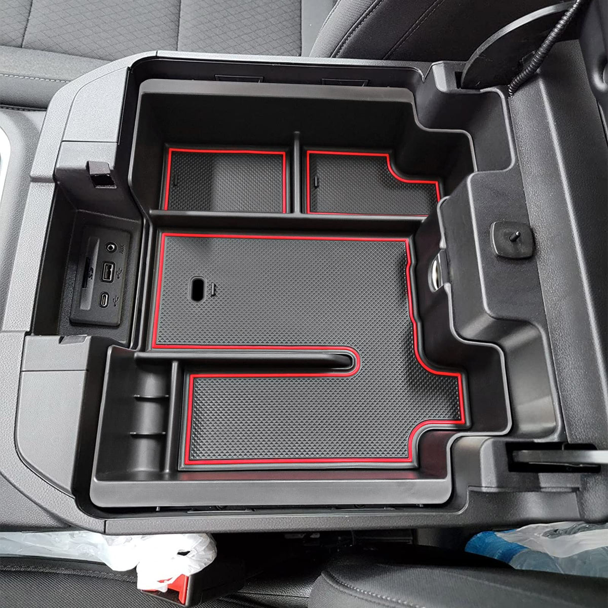 EDBETOS full console tray keeps phone and keys within reach in Silverado interior.