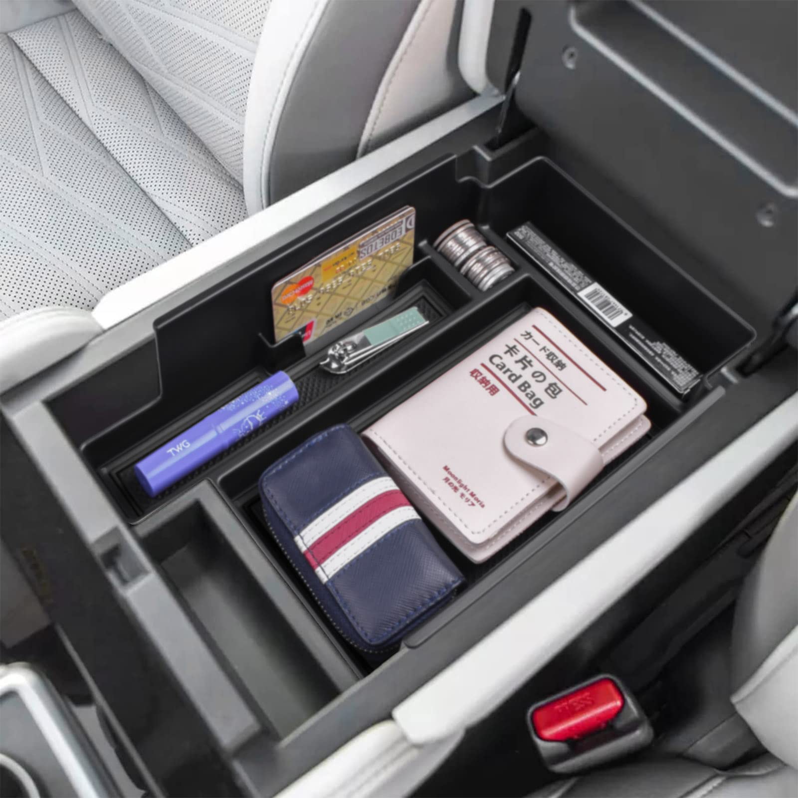 EDBETOS Pathfinder center console tray interior view showing organization