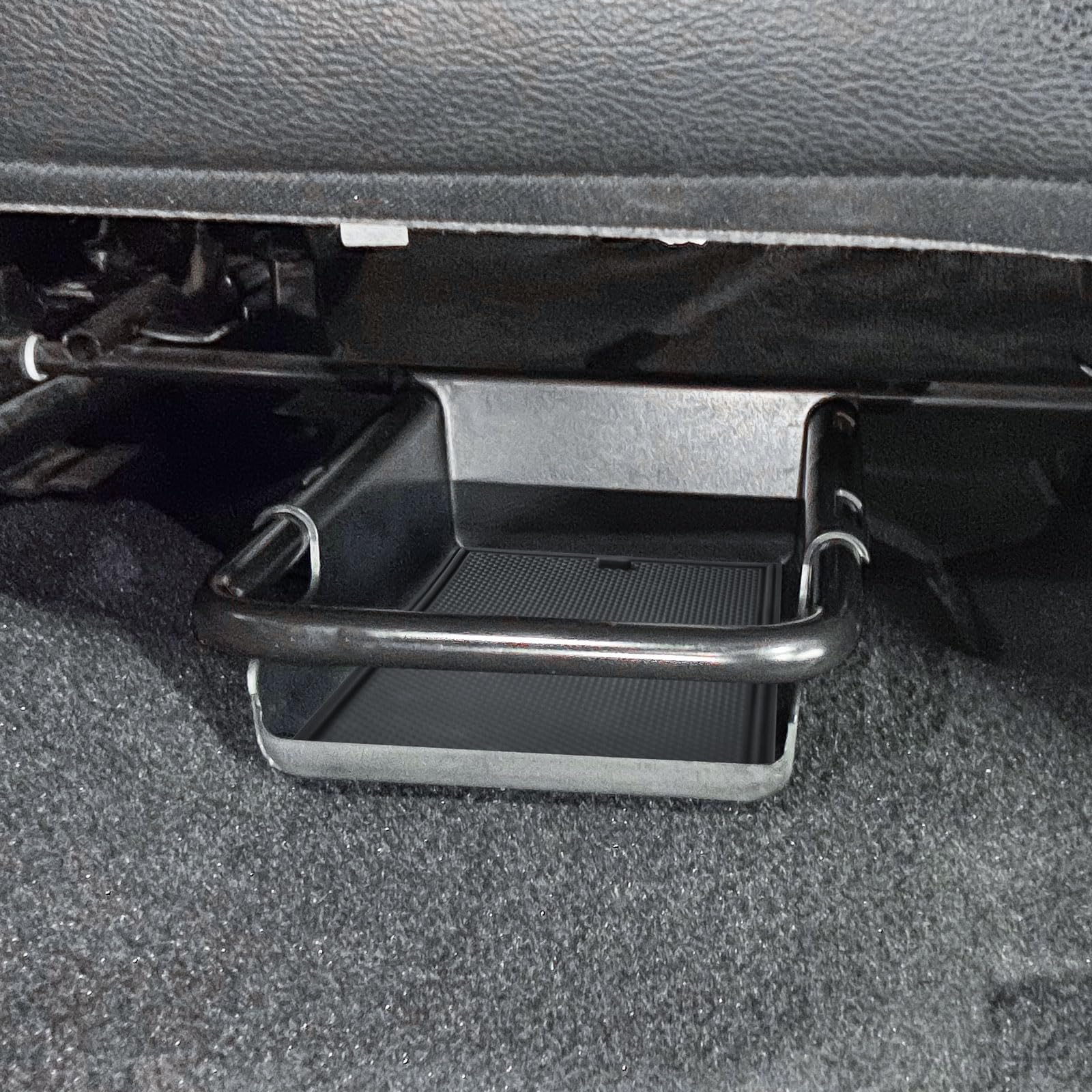 EDBETOS fitment between front seat supports creates organized cabin storage