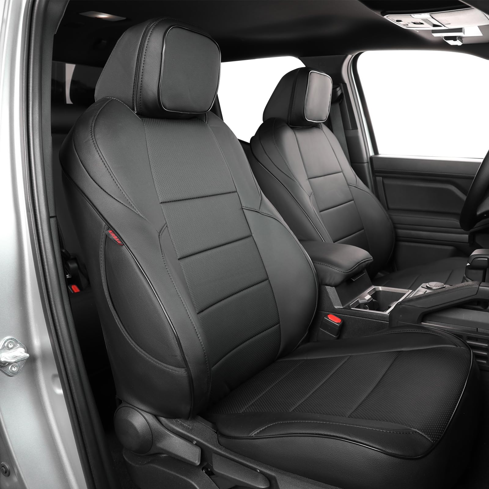 EKR Tacoma front seat covers showing leather-like texture and spill protection.