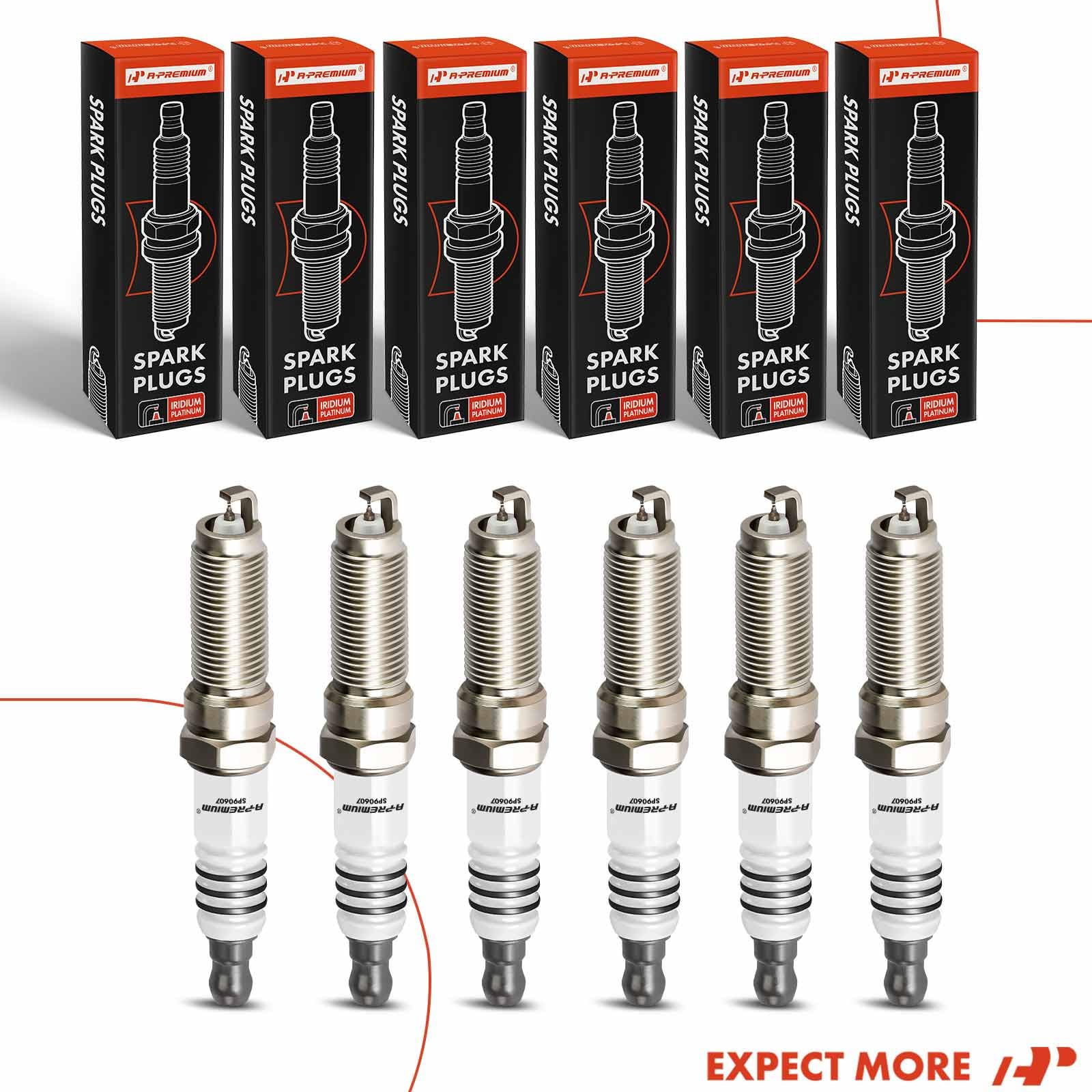 Workbench setup with spark plugs and installation guide.