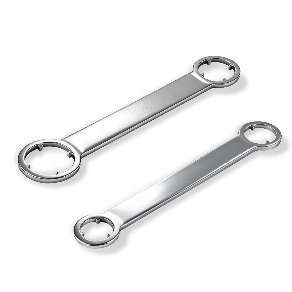 ETZ antenna removal tool and two wrenches in hand demonstrate precise bezel nut work.